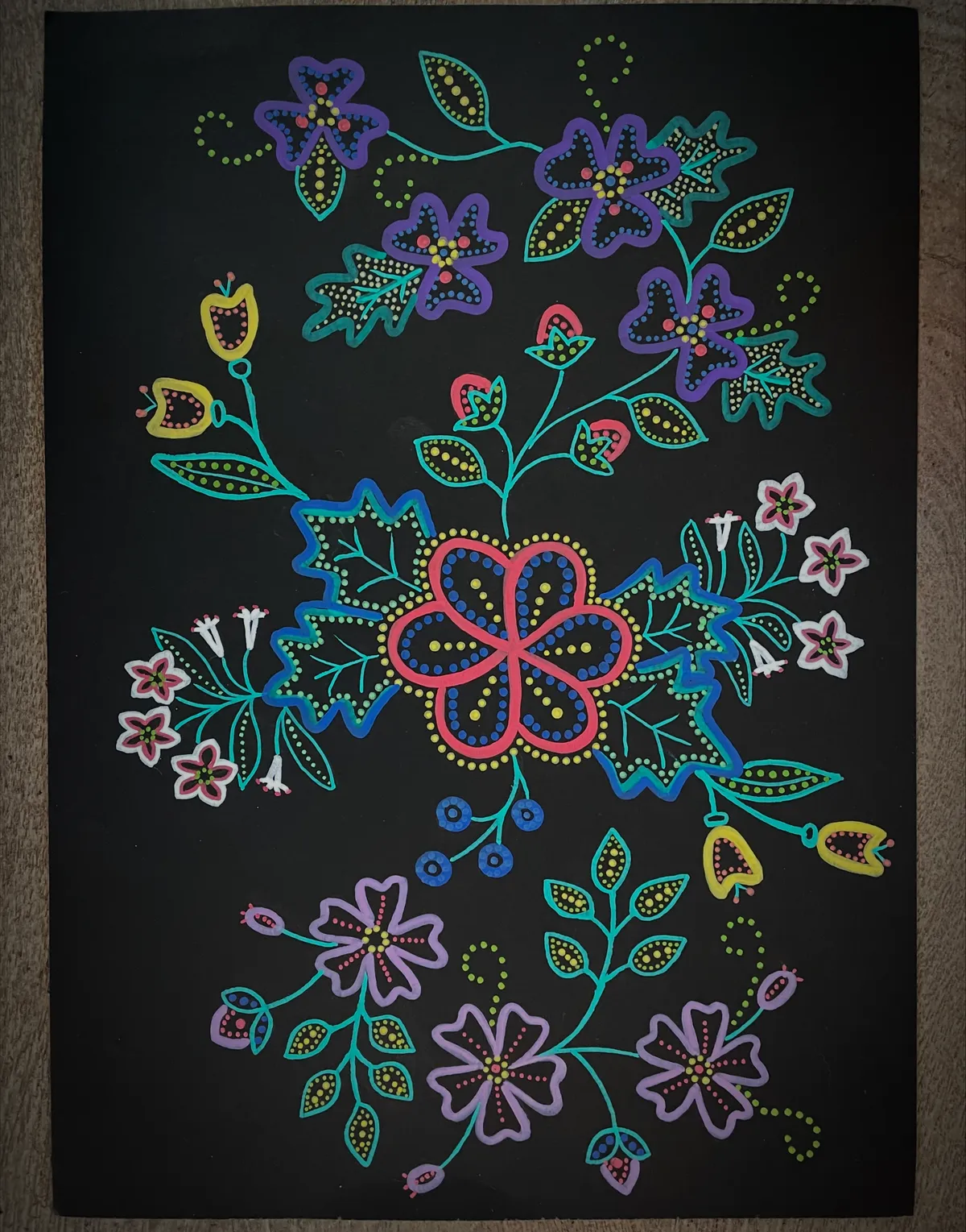Floral dot painting on black canvas